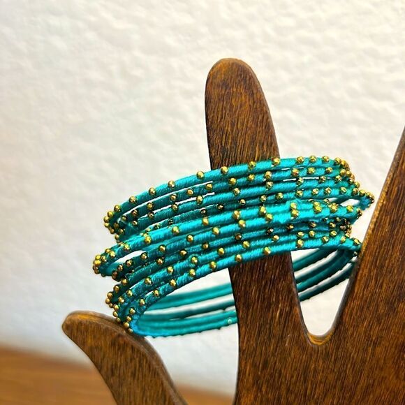 Large Lot of Brass/Thread Bracelets - Picture 2 of 3